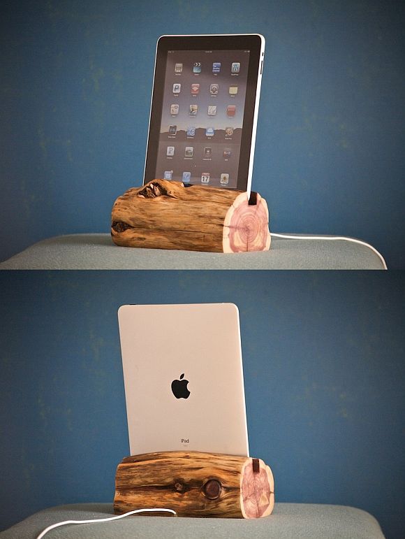 Here's an iPad dock carved out of a log SoyaCincau