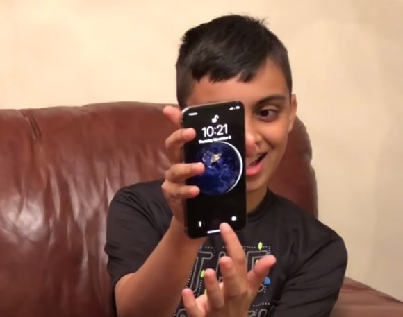 iPhone X Face ID Unlocked by 10 year old son